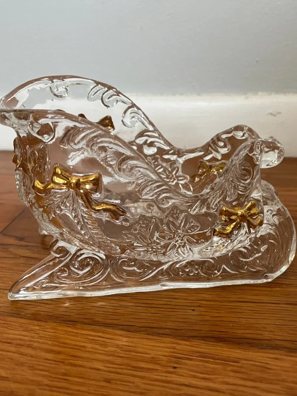 Glass sleigh with decorative gold-painted bows | Vintage